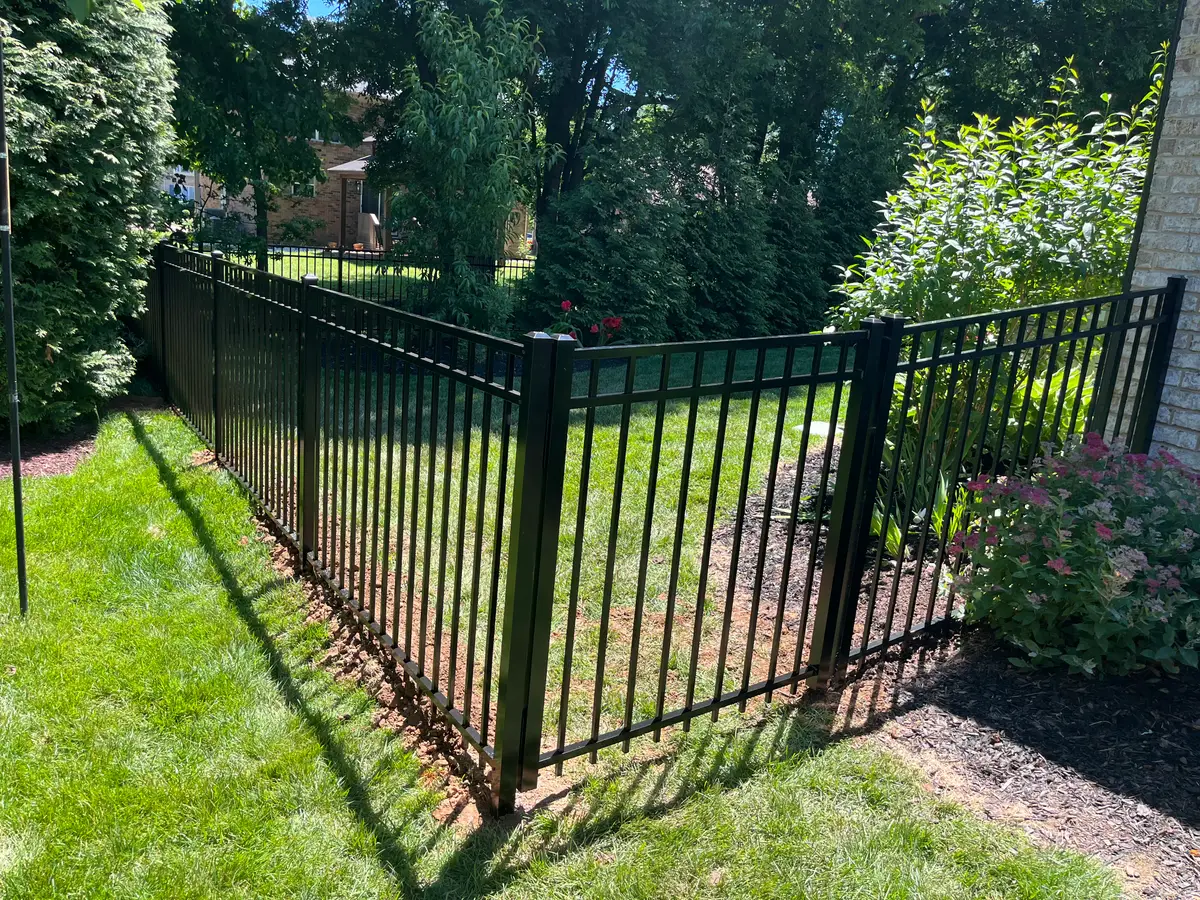 Black aluminum fence multi-section installation, installed by Duck Duck Fence