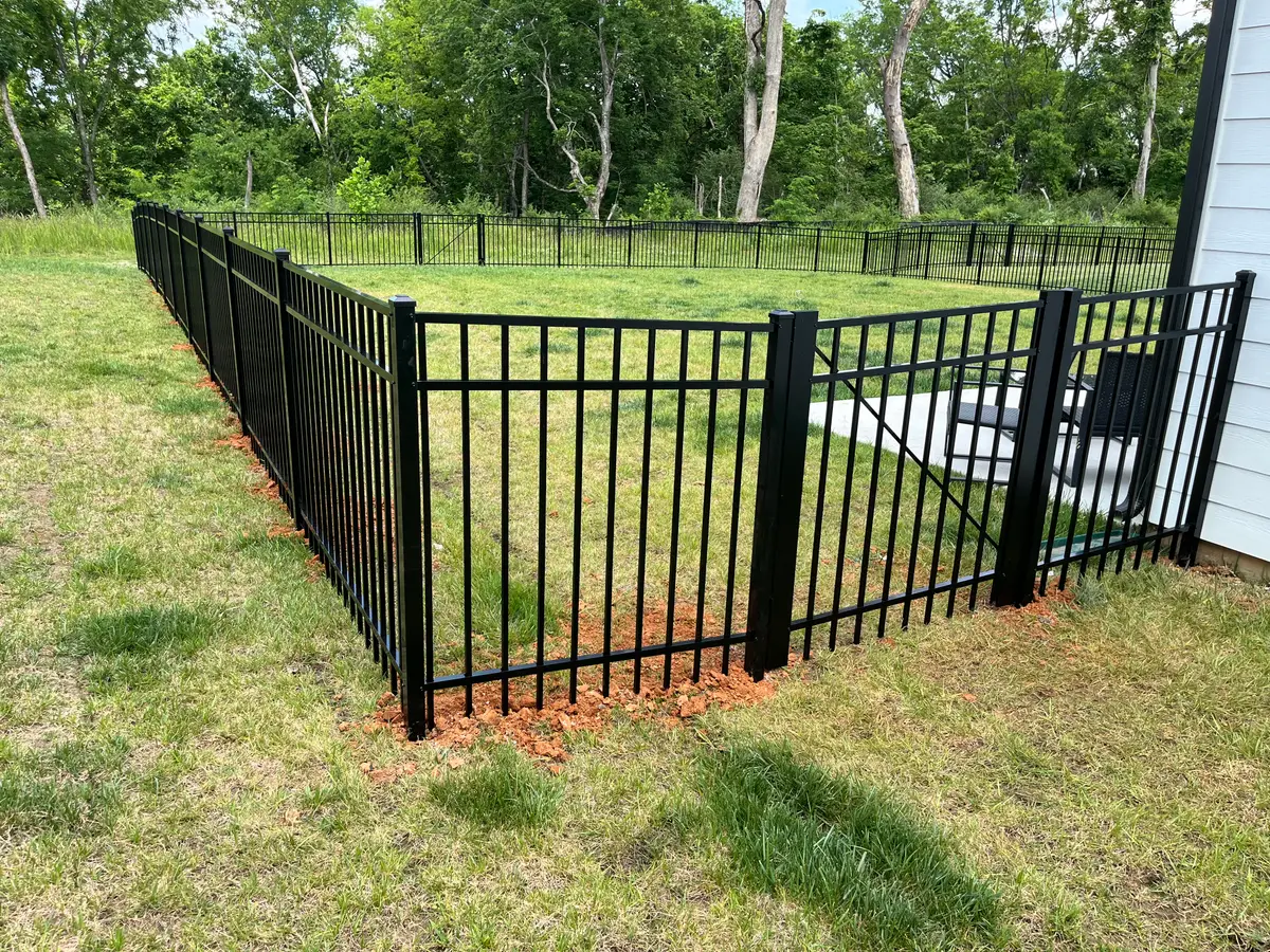Black aluminum pool fence residential, installed by Duck Duck Fence