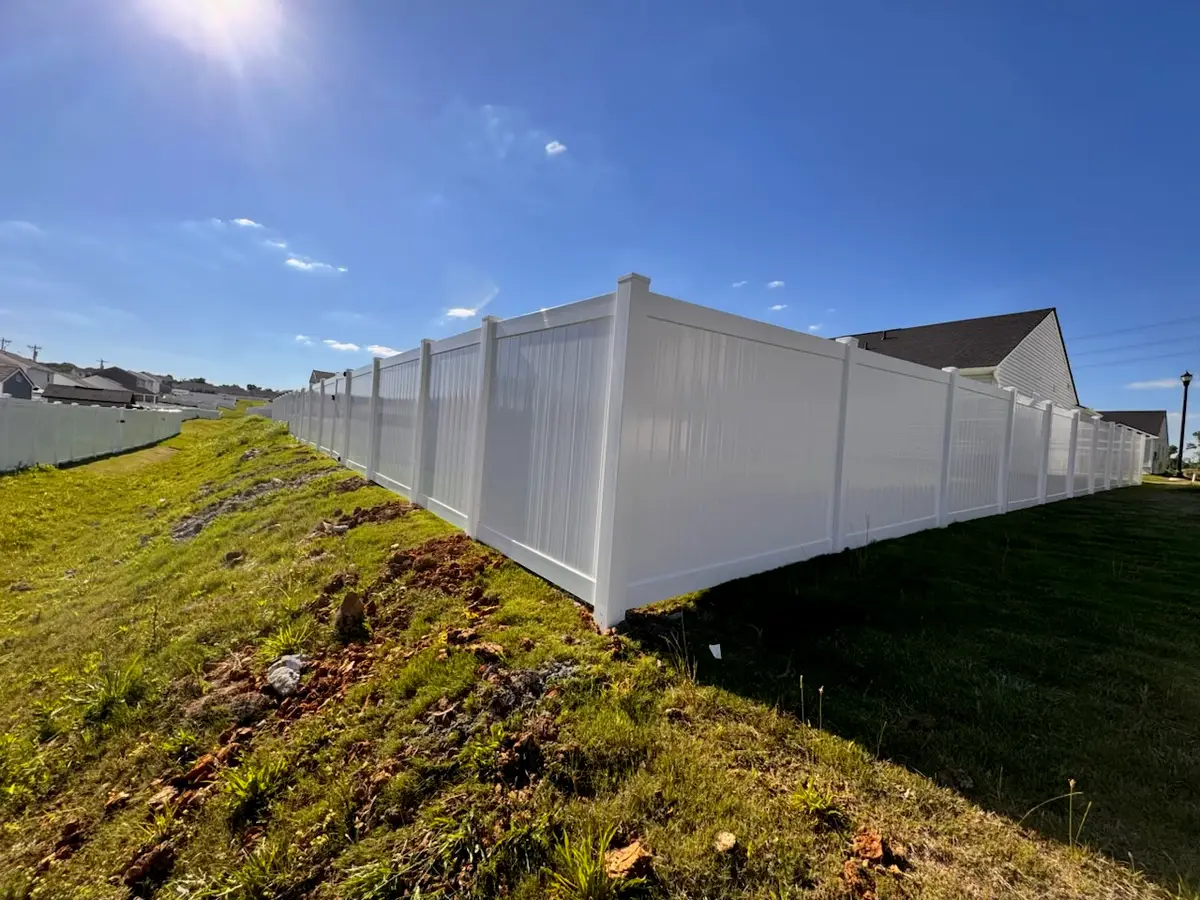 White vinyl privacy fence, installed by Duck Duck Fence