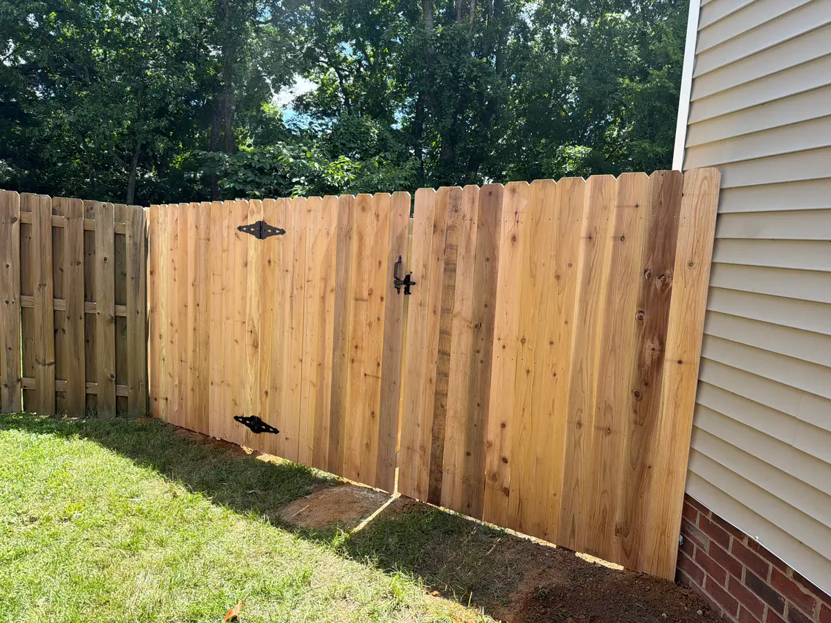 Long wooden privacy installation, installed by Duck Duck Fence