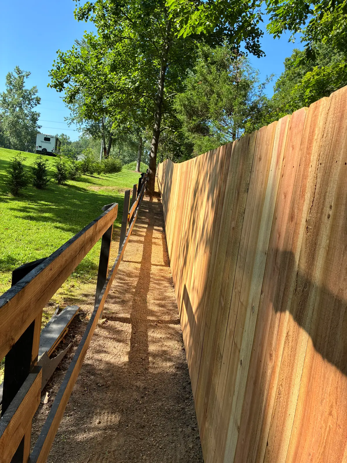 Wood privacy fence long section clean, installed by Duck Duck Fence