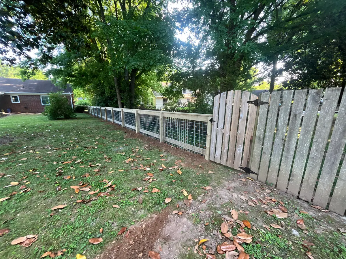 Wood fence planter box detail, installed by Duck Duck Fence