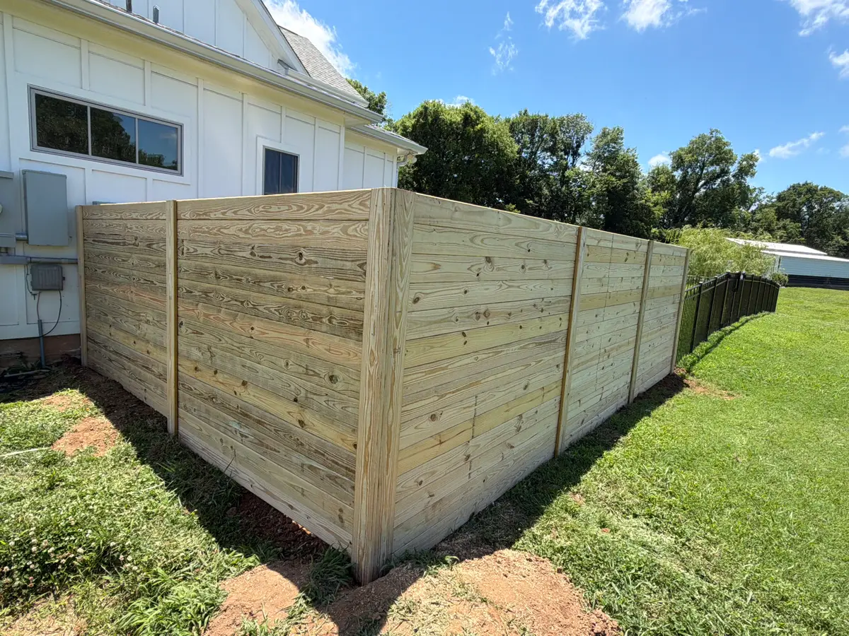 Wood and wire fence blend, installed by Duck Duck Fence