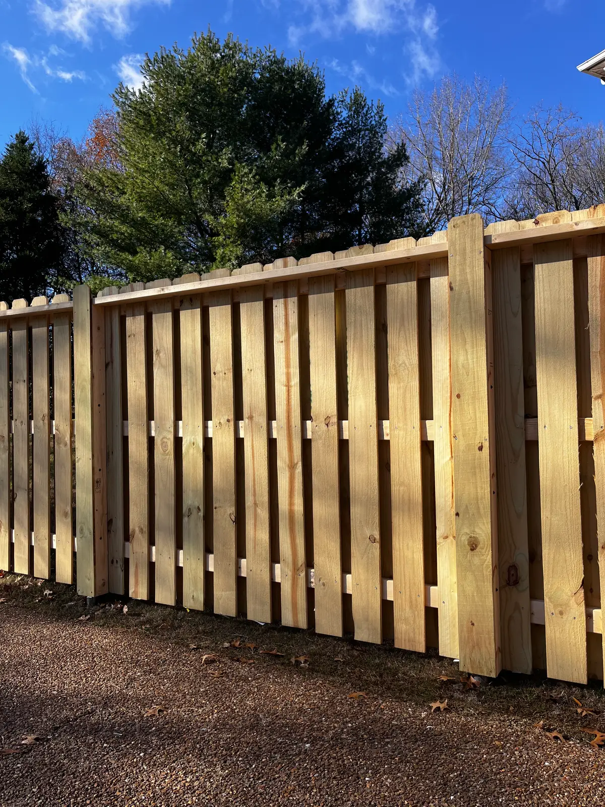 New cedar shadow-box privacy fence in a Middle Tennessee backyard